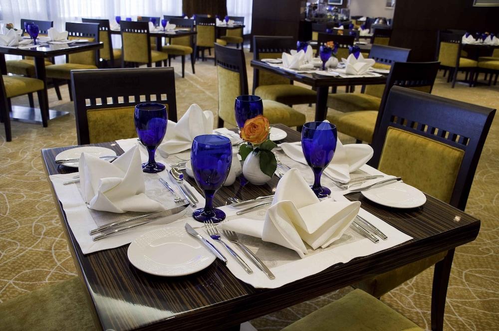 Joudyan Red Sea Mall Jeddah By Elaf Exterior photo A table set for fine dining